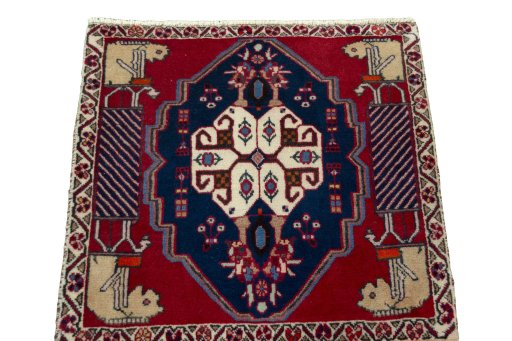 Surface texture of 2000s Shiraz rug with natural Wool and intricate pattern