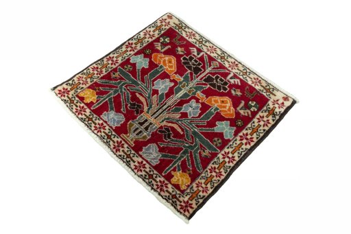 Corner detail of 2000s Shiraz rug showing border pattern and Wool pile