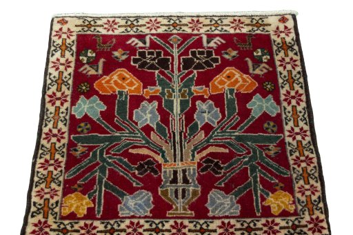 Surface texture of 2000s Shiraz rug with natural Wool and intricate pattern