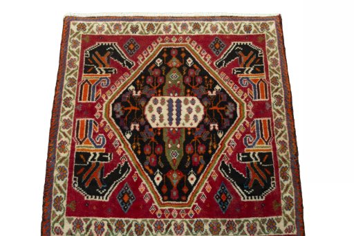 Surface texture of 2000s Shiraz rug with natural Wool and intricate pattern