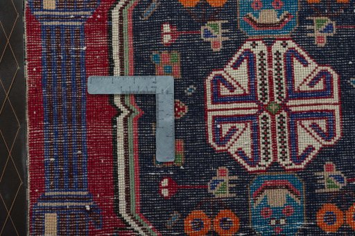 Backside of handmade 2000s Shiraz rug showing knot structure and weave density