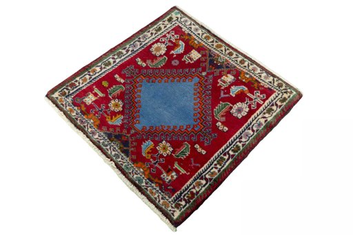 Corner detail of 2000s Shiraz rug showing border pattern and Wool pile
