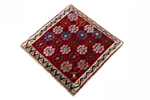 Corner detail of 2000s Shiraz rug showing border pattern and Wool pile