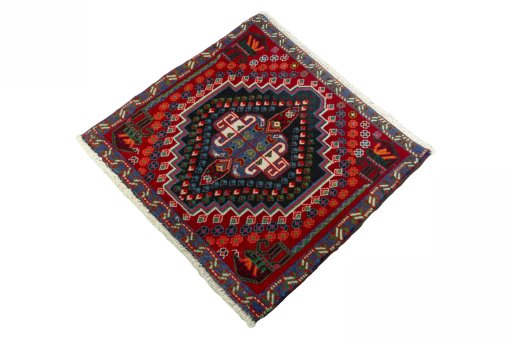 Corner detail of 2000s Shiraz rug showing border pattern and Wool pile