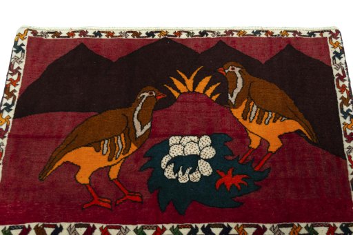 Surface texture of 2000s Shiraz rug with natural Wool and intricate pattern