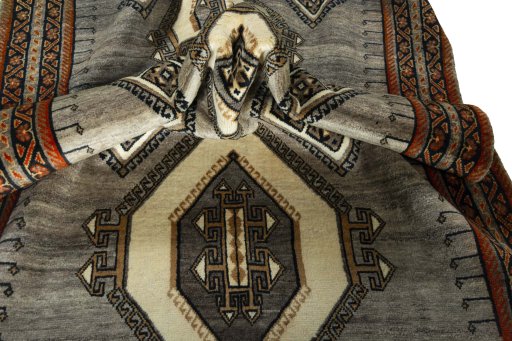 Corner detail of 2000s Shiraz rug showing border pattern and Wool pile