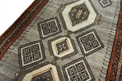 Backside of handmade 2000s Shiraz rug showing knot structure and weave density
