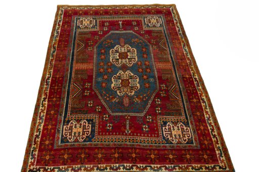 Surface texture of 2000s Shiraz rug with natural Wool and intricate pattern