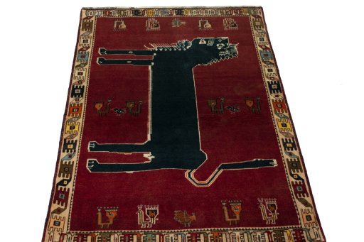 Surface texture of 2000s Shiraz rug with natural Wool and intricate pattern