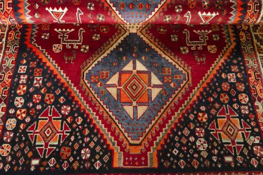 Full view of 2000s Shiraz rug from Iran / Persia, 244 × 147 cm in Red tones