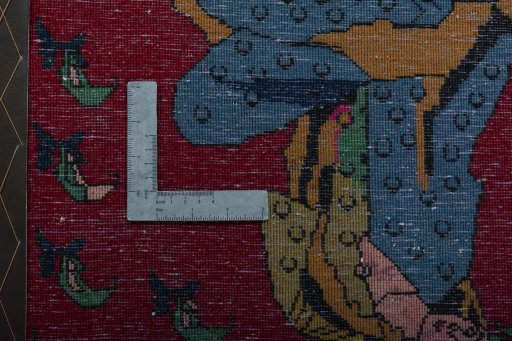 Backside of handmade 2000s Shiraz rug showing knot structure and weave density