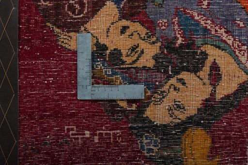 Backside of handmade 2000s Shiraz rug showing knot structure and weave density