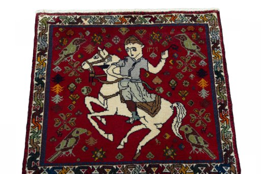 Surface texture of 2000s Shiraz rug with natural Wool and intricate pattern