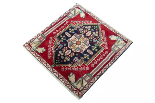 Corner detail of 2000s Shiraz rug showing border pattern and Wool pile