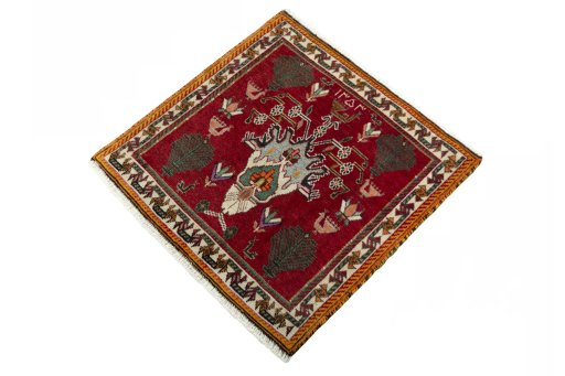 Corner detail of 2000s Shiraz rug showing border pattern and Wool pile