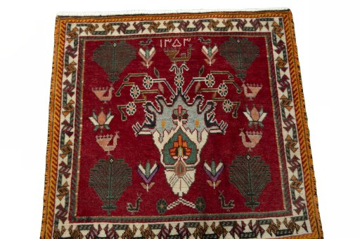 Surface texture of 2000s Shiraz rug with natural Wool and intricate pattern
