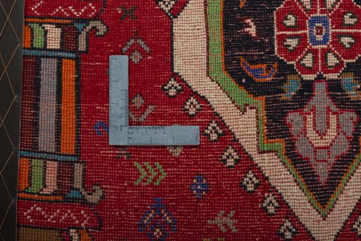 Backside of handmade 2000s Shiraz rug showing knot structure and weave density