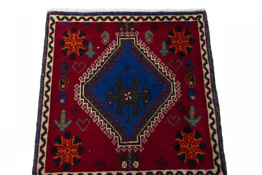 Surface texture of 2000s Shiraz rug with natural Wool and intricate pattern