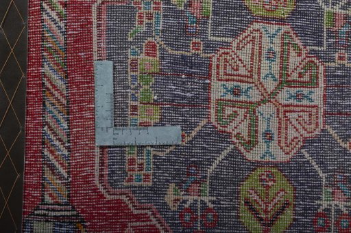 Backside of handmade 2000s Shiraz rug showing knot structure and weave density