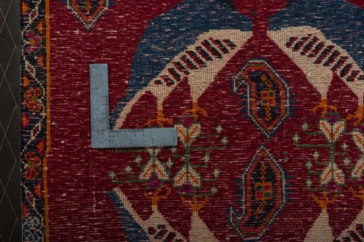 Backside of handmade 2000s Shiraz rug showing knot structure and weave density