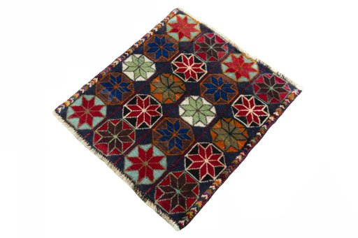 Corner detail of 2000s Shiraz rug showing border pattern and Wool pile