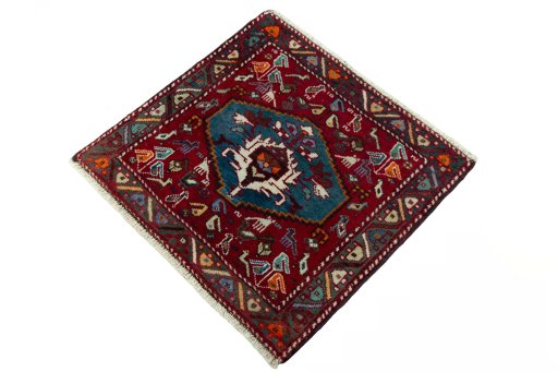 Corner detail of 2000s Shiraz rug showing border pattern and Wool pile