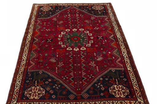 Surface texture of 2000s Shiraz rug with natural Wool and intricate pattern