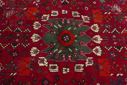 Central medallion detail of 2000s Shiraz rug from Iran / Persia
