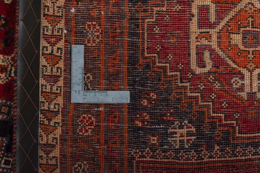 Surface texture of 2000s Shiraz rug with natural Wool and intricate pattern
