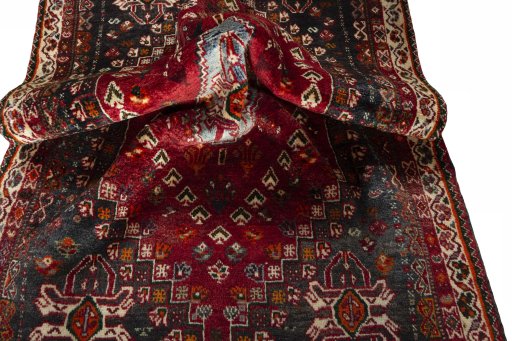 Close-up detail of 2000s Shiraz rug from Iran / Persia showing Wool weave