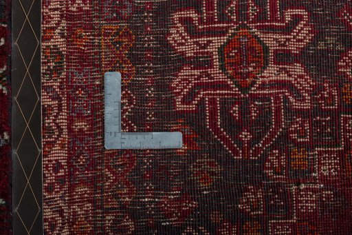 Surface texture of 2000s Shiraz rug with natural Wool and intricate pattern
