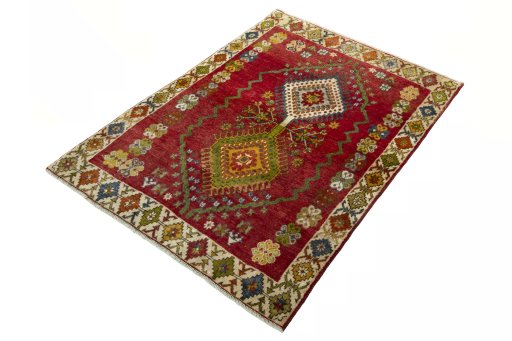 Corner detail of 2000s Shiraz rug showing border pattern and Wool pile