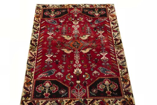 Surface texture of 2000s Shiraz rug with natural Wool and intricate pattern