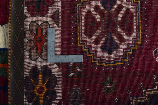 Surface texture of 2000s Shiraz rug with natural Wool and intricate pattern