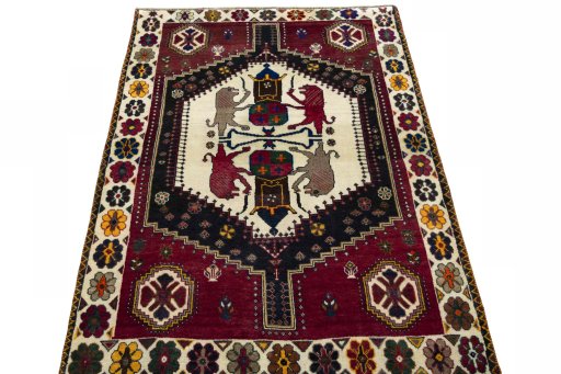 Surface texture of 2000s Shiraz rug with natural Wool and intricate pattern