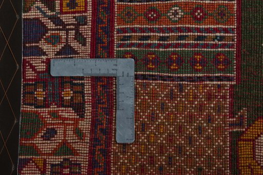 Close-up detail of 2000s Shiraz rug from Iran / Persia showing Wool weave