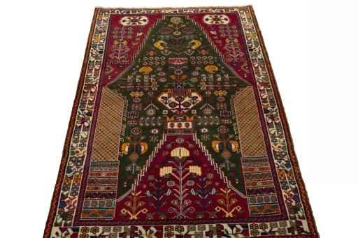 Surface texture of 2000s Shiraz rug with natural Wool and intricate pattern