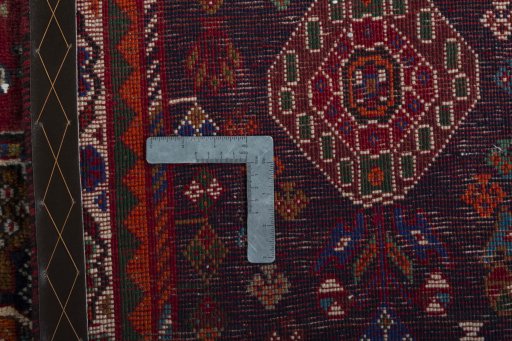 Surface texture of 1970s Shiraz rug with natural Wool and intricate pattern