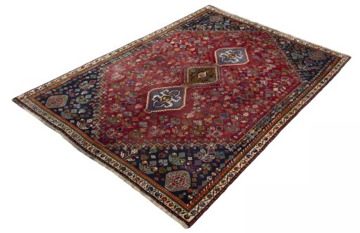 Corner detail of 1970s Shiraz rug showing border pattern and Wool pile