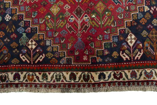 Close-up detail of 1970s Shiraz rug from Iran / Persia showing Wool weave