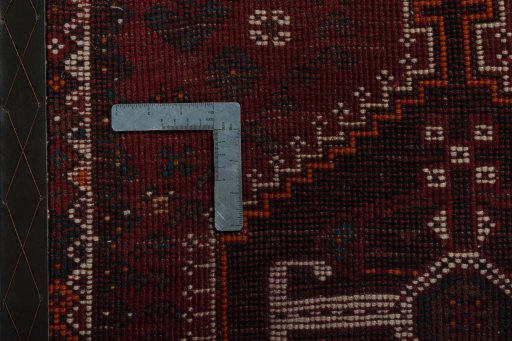 Corner detail of 2000s Shiraz rug showing border pattern and Wool pile