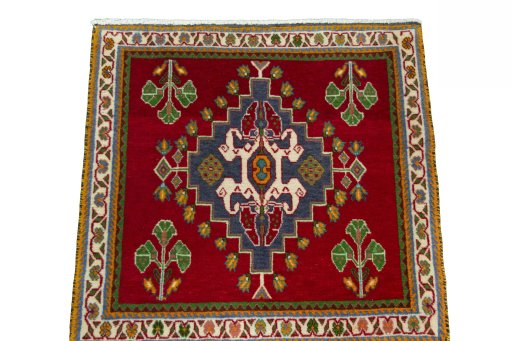Surface texture of 2000s Shiraz rug with natural Wool and intricate pattern