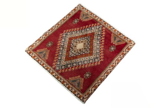 Corner detail of 2000s Shiraz rug showing border pattern and Wool pile