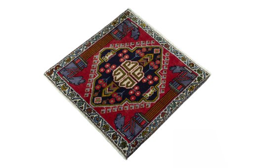 Corner detail of 2000s Shiraz rug showing border pattern and Wool pile