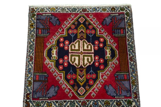 Surface texture of 2000s Shiraz rug with natural Wool and intricate pattern