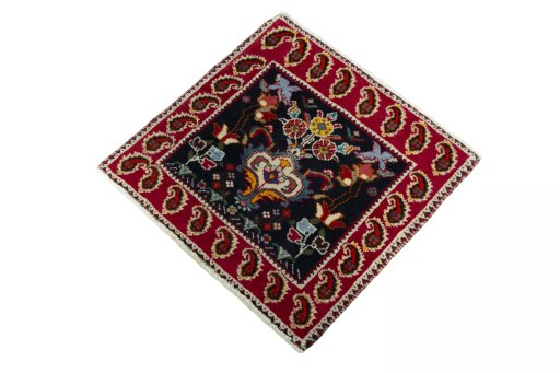 Corner detail of 2000s Shiraz rug showing border pattern and Wool pile