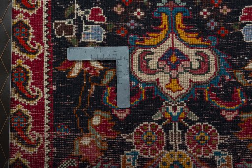 Backside of handmade 2000s Shiraz rug showing knot structure and weave density