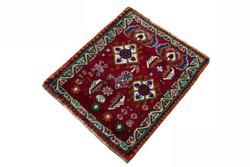 Corner detail of 2000s Shiraz rug showing border pattern and Wool pile