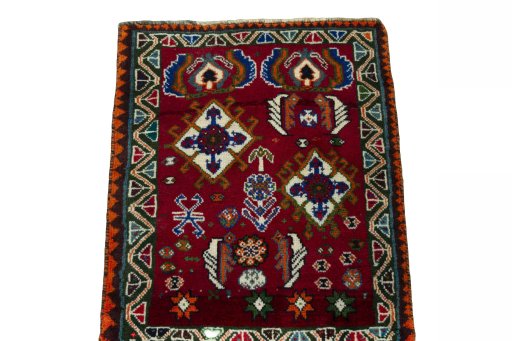 Surface texture of 2000s Shiraz rug with natural Wool and intricate pattern