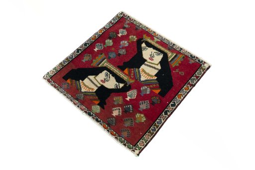 Corner detail of 2000s Shiraz rug showing border pattern and Wool pile